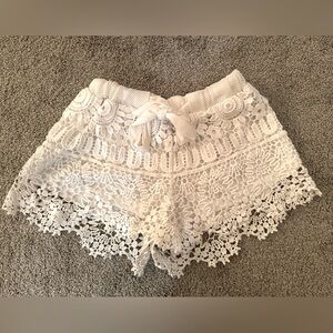 White lace shorts